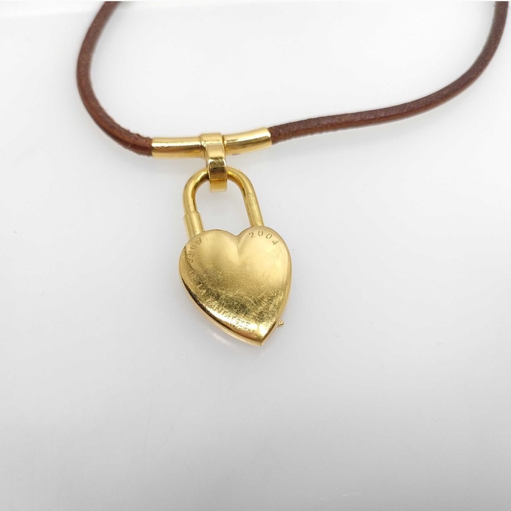 Hermès “Vive L’Idée” heart-shaped cadena padlock on brown leather cord choker - Picture 6 of 6